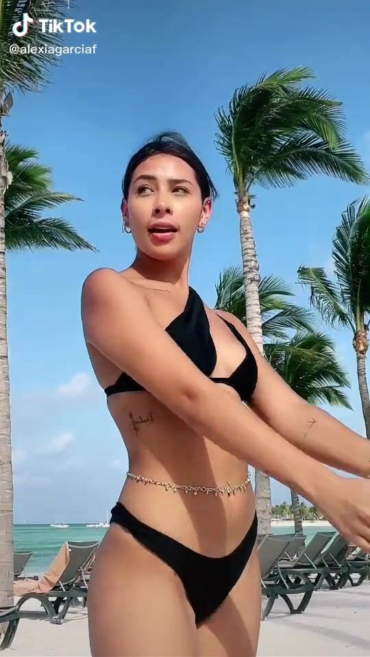 Adorable Alexia García in Seductive Black Bikini at the Beach