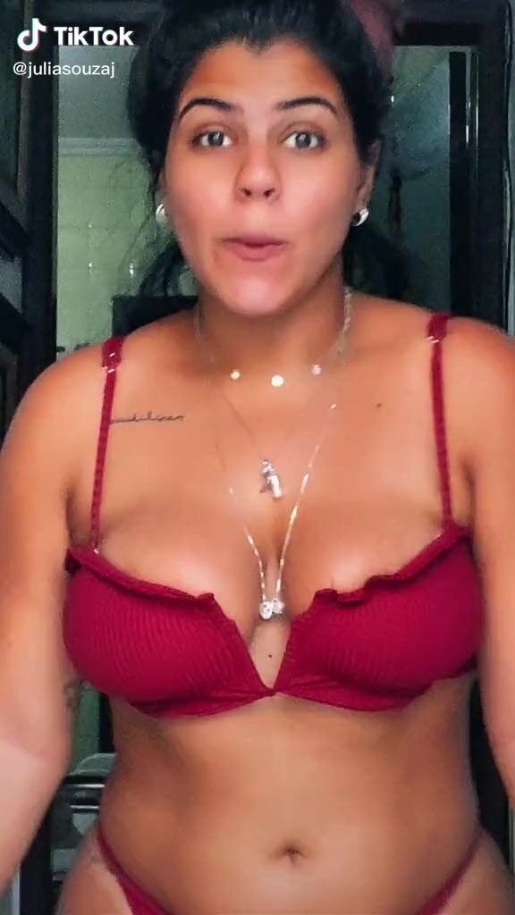 Erotic Julia Antunes Shows Cleavage And Bouncing Boobs In Red Bikini