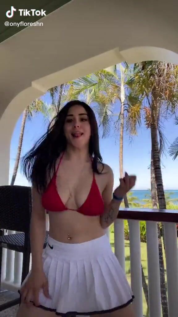 Sexy Nice Flores Shows Cleavage In Red Bikini Top And Bouncing Boobs