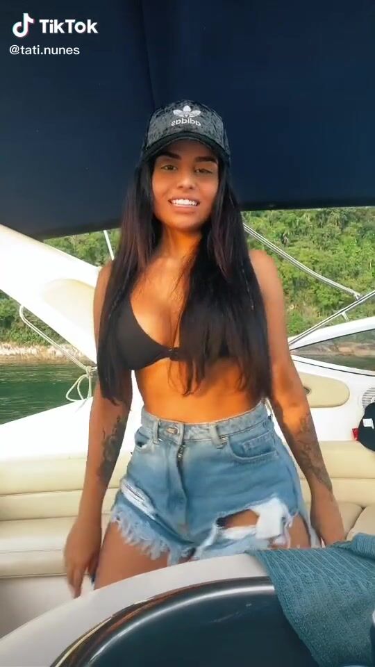 Beautiful Tati Nunes Shows Cleavage In Sexy Black Bikini Top On A Boat