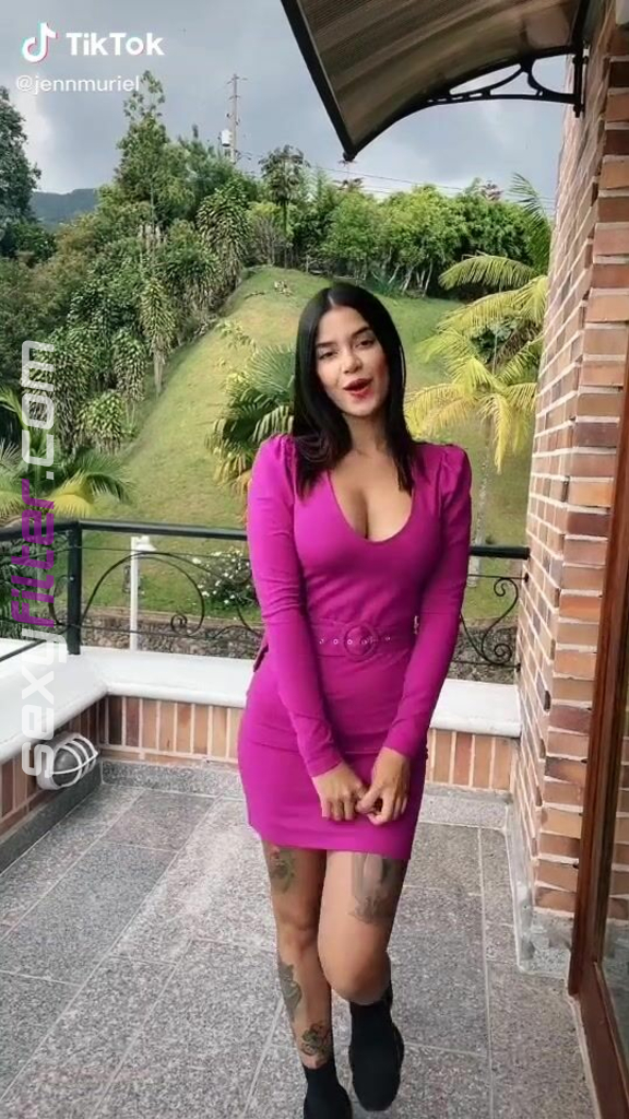 Sexy Jenn Muriel Shows Cleavage In Pink Dress On The Balcony