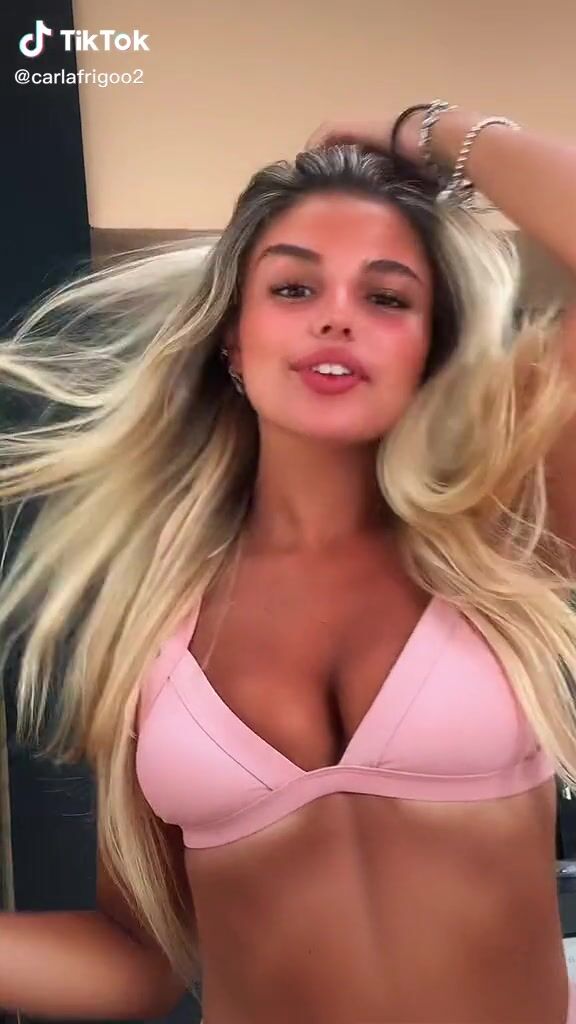 Gorgeous Carla Frigo Shows Cleavage In Alluring Pink Bikini Top Sexyfilter