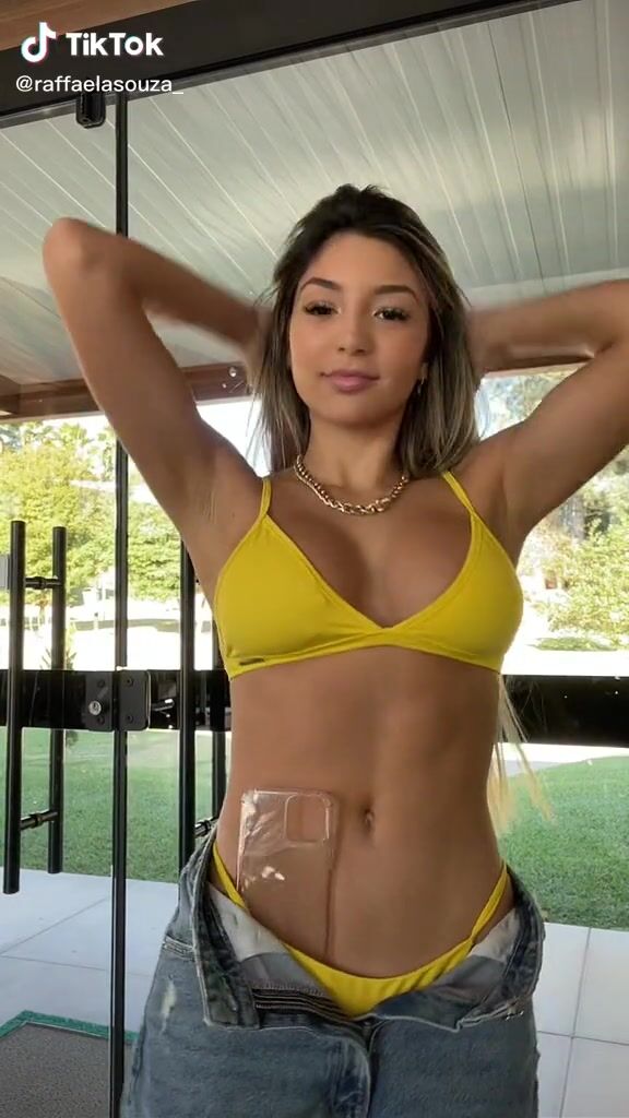 Hot Raffaela Souza Shows Cleavage In Yellow Bikini Top Sexyfilter