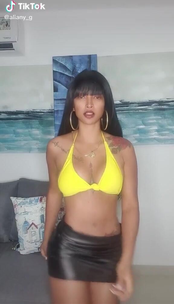 Sexy Aliany García Shows Cleavage in Yellow Bikini Top sexyfilter