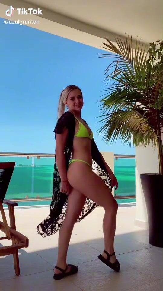 Beautiful Azul Granton Shows Cleavage In Sexy Lime Green Bikini