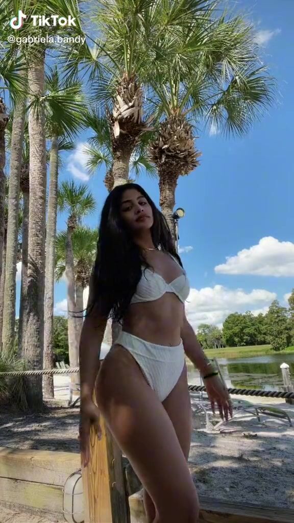 Cute Gabriela Bandy Shows Cleavage In White Bikini Sexyfilter