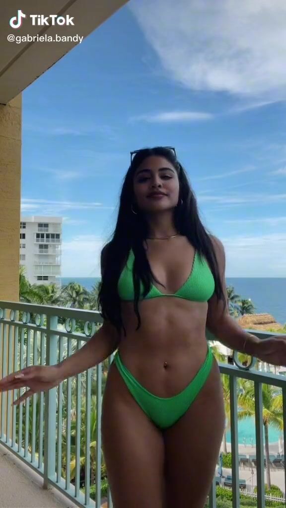 Sexy Gabriela Bandy Shows Cleavage In Green Bikini Sexyfilter