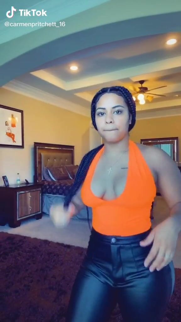 Hot Carmen Pritchett Shows Cleavage In Electric Orange Top Sexyfilter