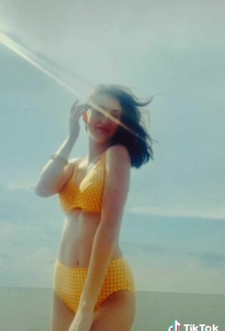 5. Sexy Joanna Crauswell in Yellow Bikini at the Beach