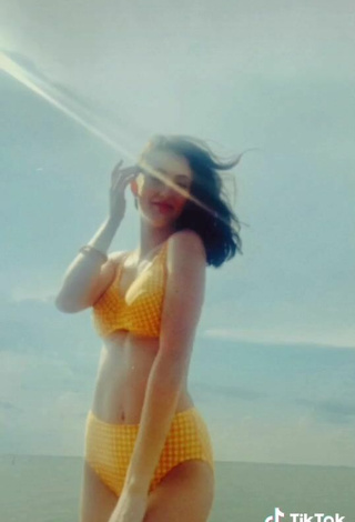 6. Sexy Joanna Crauswell in Yellow Bikini at the Beach