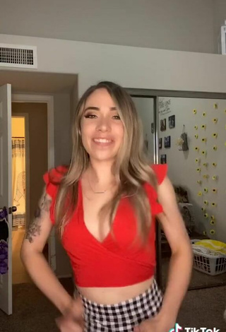 5. Hot Amber Quinn Shows Cleavage in Red Crop Top