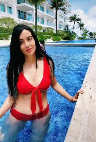 Gorgeous Adriana Valcárcel in Alluring Red Bikini at the Swimming Pool