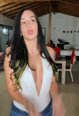 2. Sexy Adriana Valcárcel Shows Cleavage in White Bodysuit