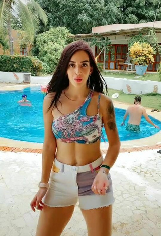 5. Cute Adriana Valcárcel in Floral Bikini Top at the Pool