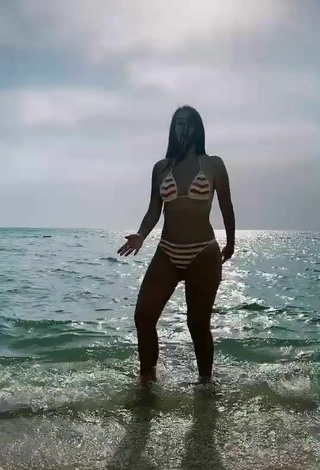 3. Sweet Adriana Valcárcel in Cute Striped Bikini in the Sea