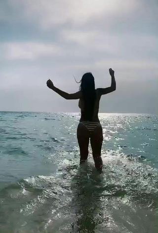 5. Sweet Adriana Valcárcel in Cute Striped Bikini in the Sea