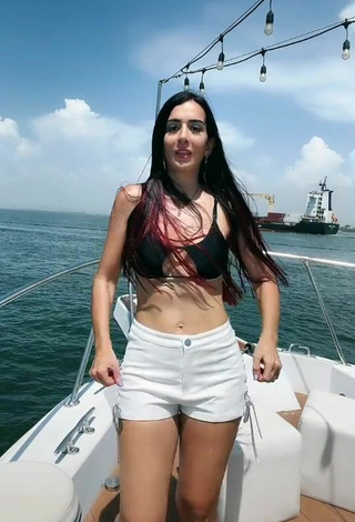 2. Hot Adriana Valcárcel in Black Bikini Top on a Boat