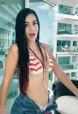 4. Sexy Adriana Valcárcel in Striped Bikini Top