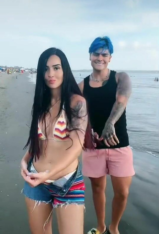 4. Sexy Adriana Valcárcel in Striped Bikini at the Beach