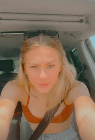 Sexy Ali Mykal in Orange Hot Top in a Car