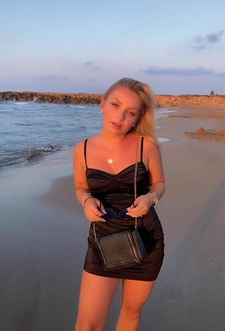 Hot Alina Mour in Black Dress at the Beach
