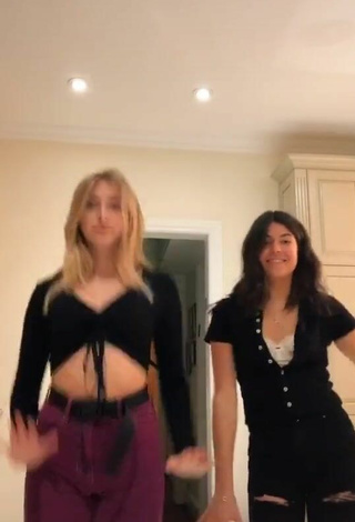 3. Sweetie Ally Jenna Shows Cleavage in Black Crop Top