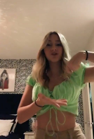 2. Cute Ally Jenna Shows Cleavage in Green Crop Top