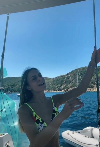 2. Sexy Ambra Cotti Shows Legs on a Boat