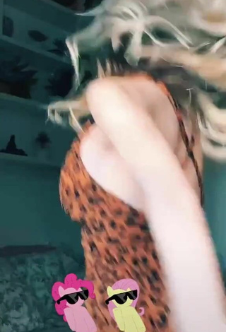 4. Sexy Ananda Morais Shows Cleavage in Leopard Sundress Braless