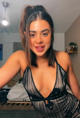 3. Sexy Angel Baranes Shows Cleavage in Black Dress Braless