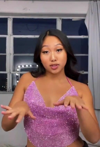 2. Sexy Anneston Pisayavong Shows Cleavage in Purple Top without Bra