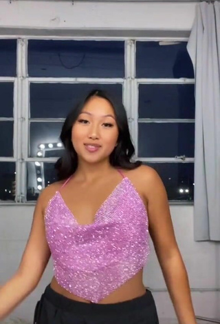 3. Sexy Anneston Pisayavong Shows Cleavage in Purple Top without Bra