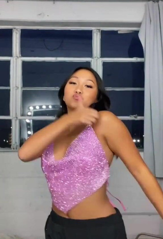 5. Sexy Anneston Pisayavong Shows Cleavage in Purple Top without Bra
