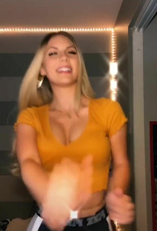 1. Magnificent Arianna Flowers Shows Cleavage and Bouncing Boobs in Orange Crop Top