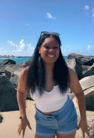 5. Sexy Asha Christine in White Crop Top at the Beach