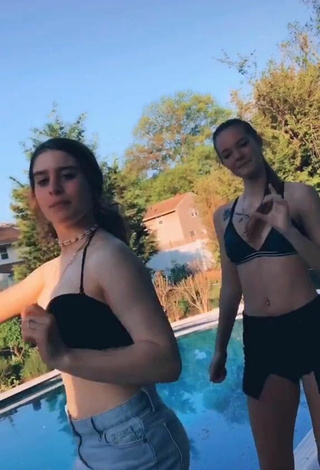 5. Cute Bri Powell in Black Bikini Top at the Swimming Pool