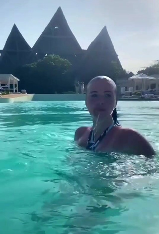 4. Sexy Ksusha Karpova in Floral Bikini at the Pool