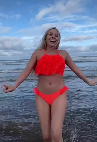 1. Sexy Maga in Orange Bikini at the Swimming Pool