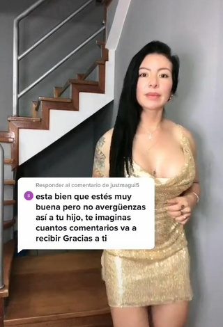 Hot Adriana Espitia Shows Cleavage in Golden Dress