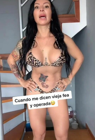 Hot Adriana Espitia Shows Cleavage in Leopard Bikini
