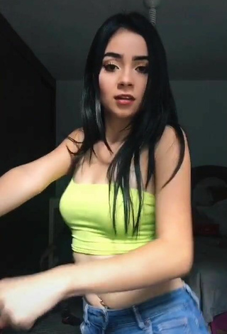 3. Sexy Ale Galván in Lime Green Crop Top