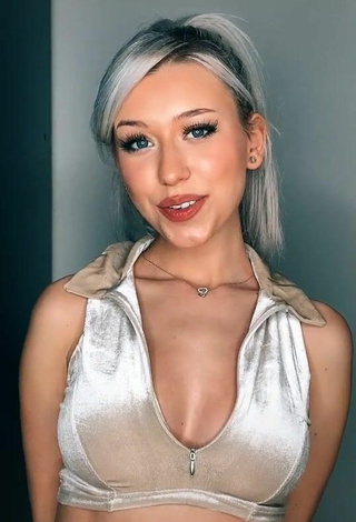 Sweetie Alexis Feather Shows Cleavage in Silver Crop Top