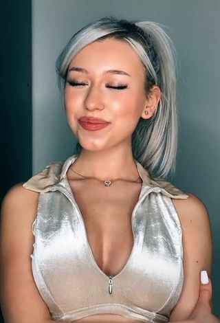 5. Sweetie Alexis Feather Shows Cleavage in Silver Crop Top
