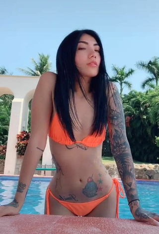 1. Sweetie Nicole Amado in Electric Orange Bikini at the Pool