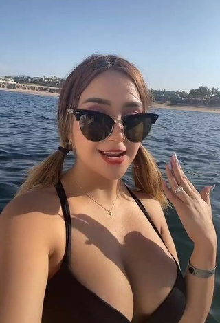 4. Sexy Abril Abdamari Garza Alonso Shows Cleavage in Black Bikini Top on a Boat