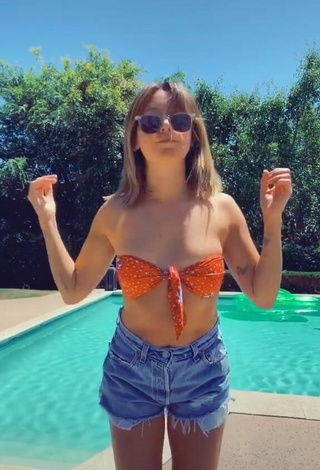 4. Sweetie Ashley Tisdale in Orange Bikini Top at the Swimming Pool