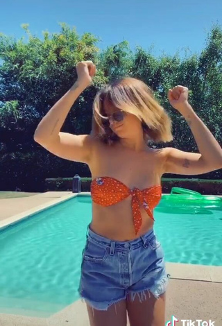 5. Sweetie Ashley Tisdale in Orange Bikini Top at the Swimming Pool