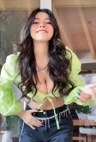 2. Wonderful Aylin Criss Shows Cleavage in Lime Green Crop Top