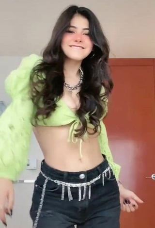 2. Pretty Aylin Criss Shows Cleavage in Lime Green Crop Top
