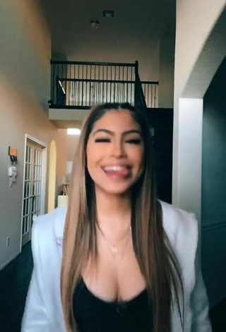 Sexy Desiree Montoya Shows Cleavage in Black Top